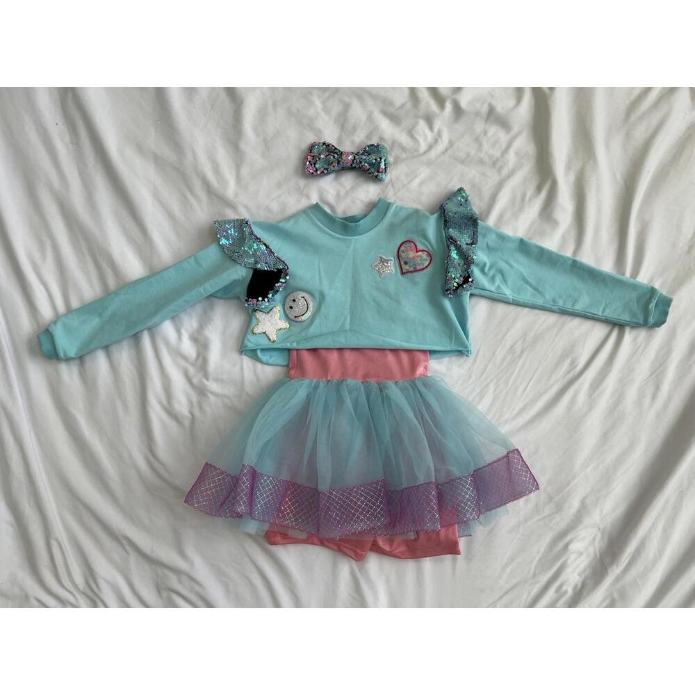 Revolution girls size medium pink and teal dance costume
